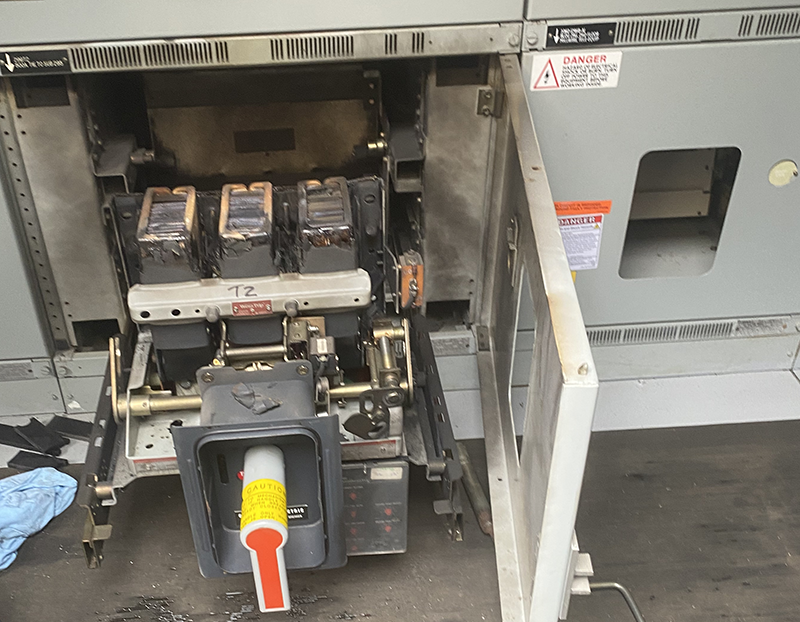 field photo of a circuit breaker damaged by an arc flash incident